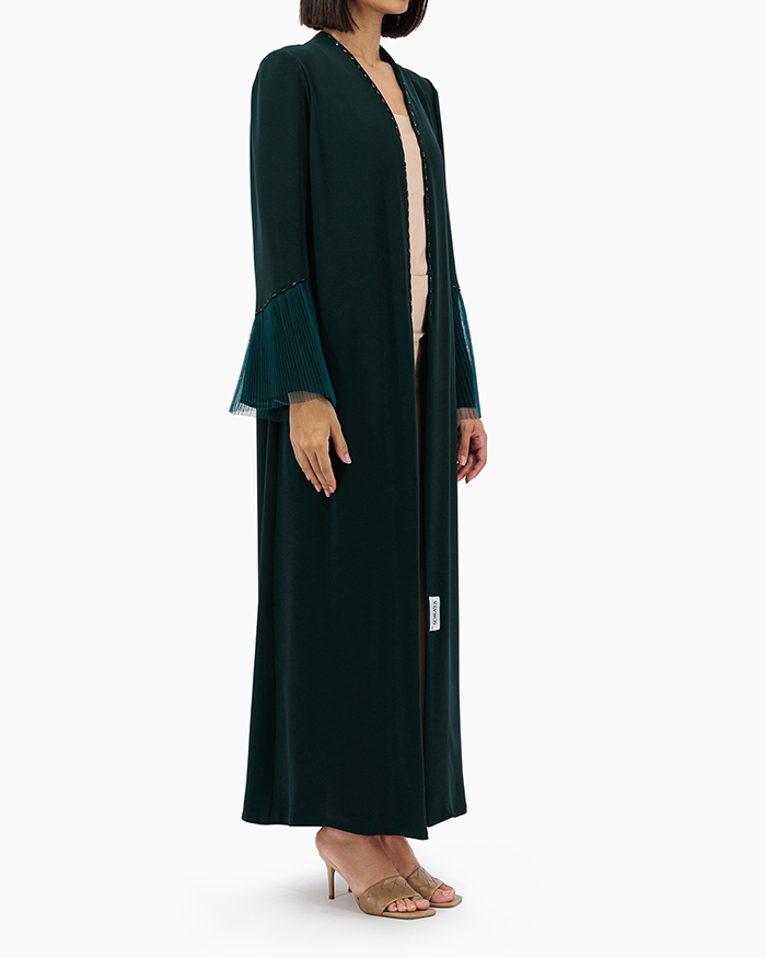 Model wears Green Abaya with Tulle Sleeves