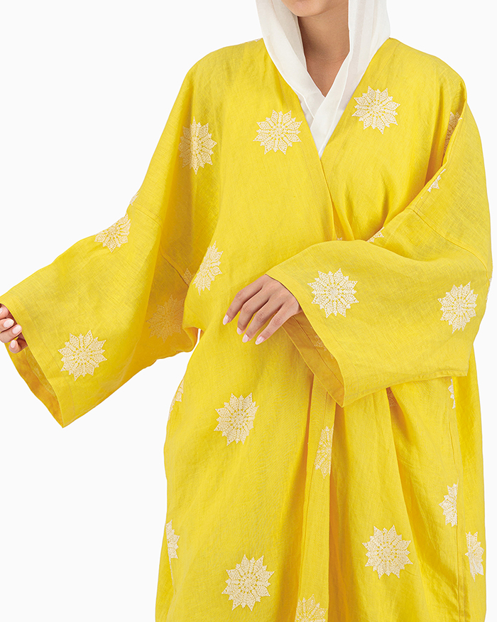 Model wears Yellow Abaya