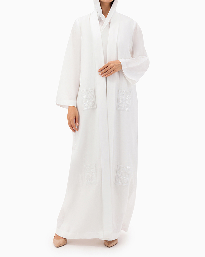 Model wears White Linen Abaya