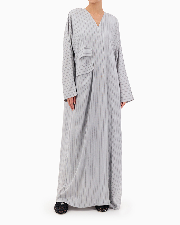 Model wears Grey Stripe Abaya