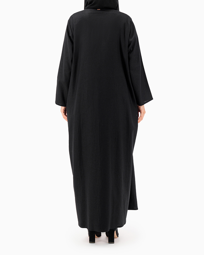 Model wears Black Thread Abaya