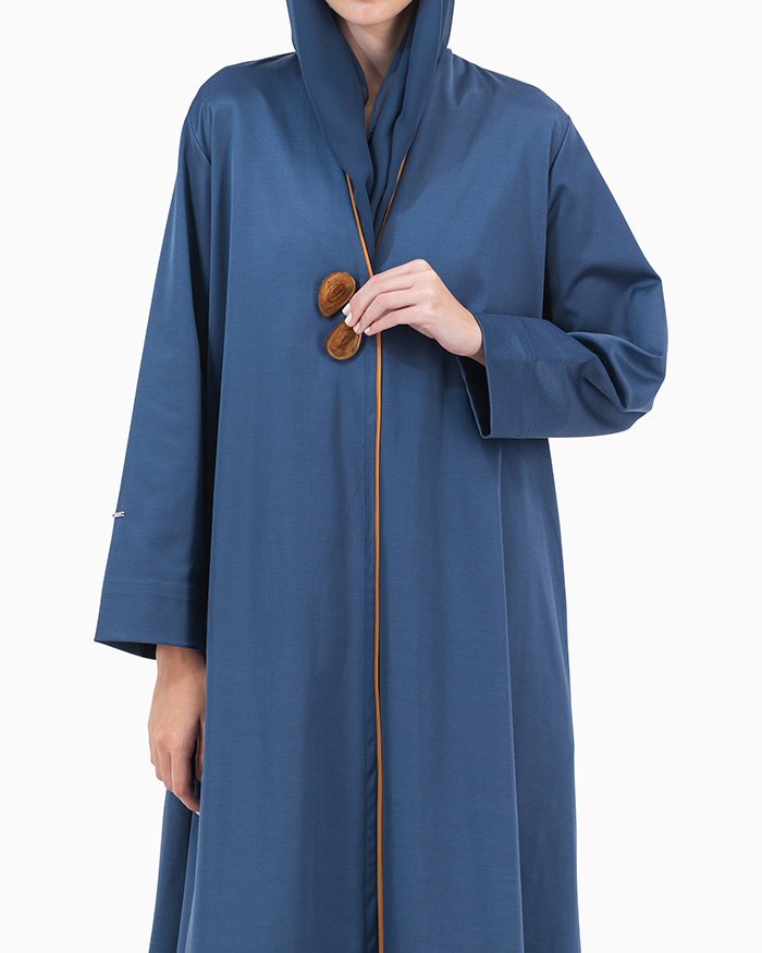 Model wears Blue Twilight Abaya With 2 Buttons